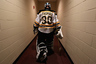 GLENDALE, AZ - DECEMBER 28:  Goaltender Tim Thomas #30 of the Boston Bruins walks back to the locker room before the NHL game against the Phoenix Coyotes at Jobing.com Arena on December 28, 2025 in Glendale, Arizona.  (Photo by Christian Petersen/Getty Images)