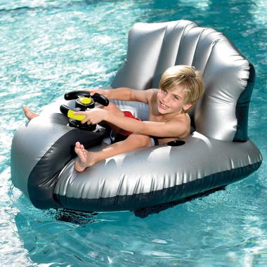 Inflatable Bumper Boat, shown with a young boy smiling, though sitting uncomfortably, in it